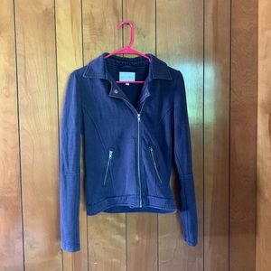 Delia’s blue jacket